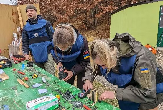 Ukrainian women and men training at a Mine Action Centre by Mriya Aid Org